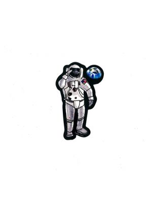 Saluting Astronaut with Earth Sticker
